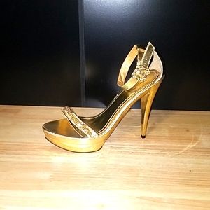 Gold stiletto heels